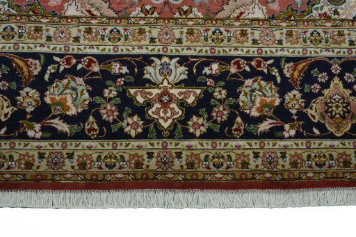 Corner detail of New Tabriz 50/60/70 Raj rug showing border pattern and Cork pile
