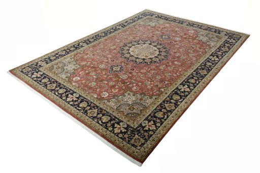 Corner detail of New Tabriz 50/60/70 Raj rug showing border pattern and Cork pile