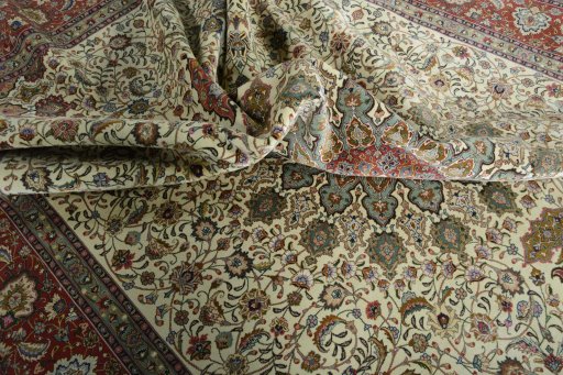 Backside of handmade New Tabriz 50/60/70 Raj rug showing knot structure and weave density