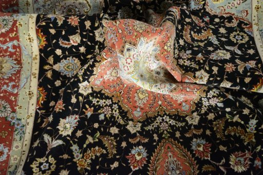 Surface texture of New Tabriz 50/60/70 Raj rug with natural Cork and intricate pattern