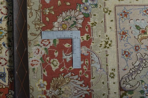 Backside of handmade New Tabriz 50/60/70 Raj rug showing knot structure and weave density