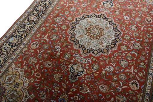 Backside of handmade New Tabriz 50/60/70 Raj rug showing knot structure and weave density