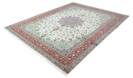Corner detail of New Tabriz 50/60/70 Raj rug showing border pattern and Cork pile