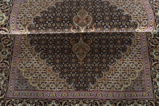 Close-up detail of New Tabriz 50/60/70 Raj rug from Iran / Persia showing Cork weave