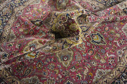 Corner detail of New Tabriz 50/60/70 Raj rug showing border pattern and Cork pile