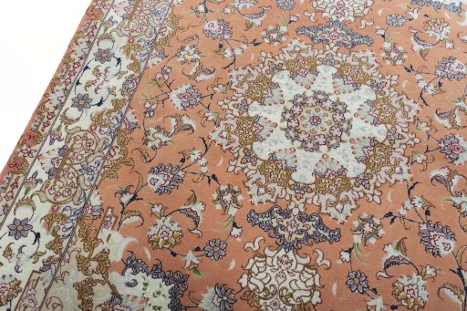 Backside of handmade New Tabriz 50/60/70 Raj rug showing knot structure and weave density