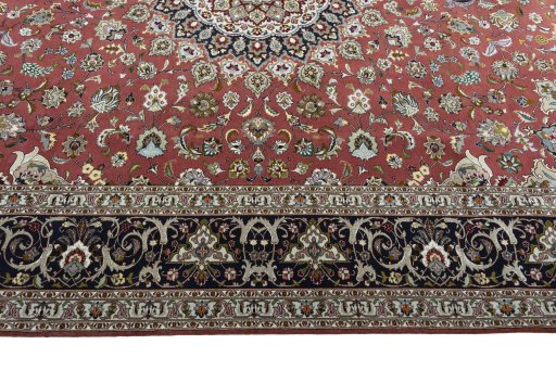 Corner detail of New Tabriz 50/60/70 Raj rug showing border pattern and Cork pile