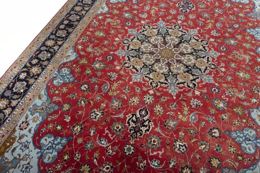 Backside of handmade New Tabriz 50/60/70 Raj rug showing knot structure and weave density