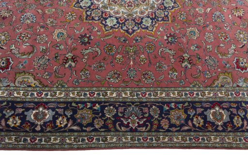 Corner detail of New Tabriz 50/60/70 Raj rug showing border pattern and Cork pile