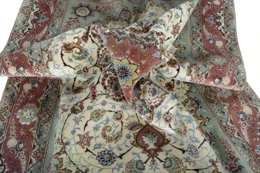 Surface texture of New Tabriz 50/60/70 Raj rug with natural Cork and intricate pattern