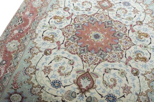 Backside of handmade New Tabriz 50/60/70 Raj rug showing knot structure and weave density