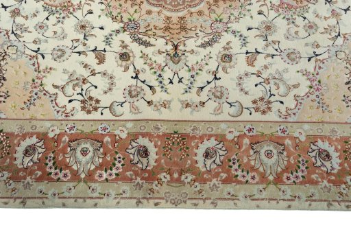 Corner detail of New Tabriz 50/60/70 Raj rug showing border pattern and Cork pile