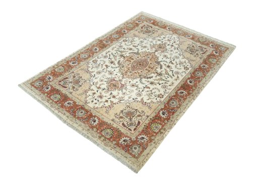 Corner detail of New Tabriz 50/60/70 Raj rug showing border pattern and Cork pile