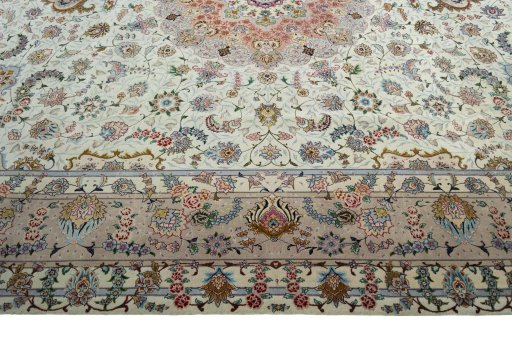 Corner detail of New Tabriz 50/60/70 Raj rug showing border pattern and Cork pile