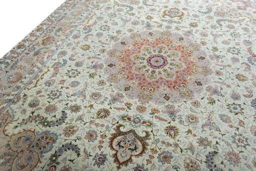 Backside of handmade New Tabriz 50/60/70 Raj rug showing knot structure and weave density