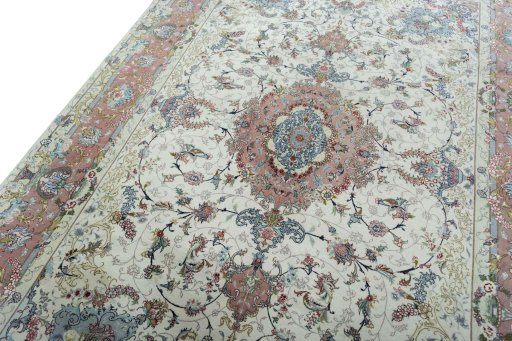 Backside of handmade New Tabriz 50/60/70 Raj rug showing knot structure and weave density