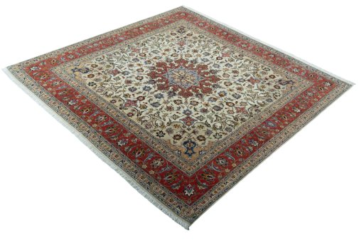 Corner detail of 2000s Tabriz 50/60/70 Raj rug showing border pattern and Cork pile