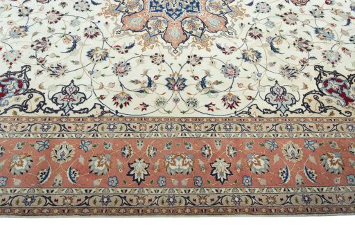 Corner detail of 2000s Tabriz 50/60/70 Raj rug showing border pattern and Cork pile