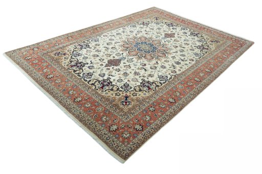 Corner detail of 2000s Tabriz 50/60/70 Raj rug showing border pattern and Cork pile