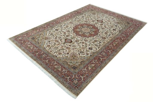Corner detail of 2000s Tabriz 50/60/70 Raj rug showing border pattern and Cork pile