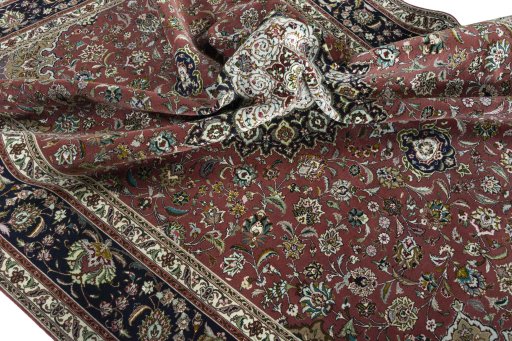 Surface texture of 2000s Tabriz 50/60/70 Raj rug with natural Cork and intricate pattern