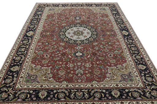 Surface texture of 2000s Tabriz 50/60/70 Raj rug with natural Cork and intricate pattern