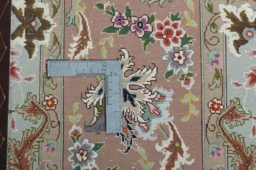 Backside of handmade 2000s Tabriz 50/60/70 Raj rug showing knot structure and weave density