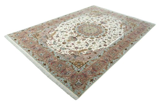 Corner detail of 2000s Tabriz 50/60/70 Raj rug showing border pattern and Cork pile