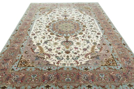 Surface texture of 2000s Tabriz 50/60/70 Raj rug with natural Cork and intricate pattern