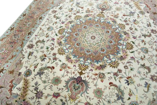 Backside of handmade 2000s Tabriz 50/60/70 Raj rug showing knot structure and weave density