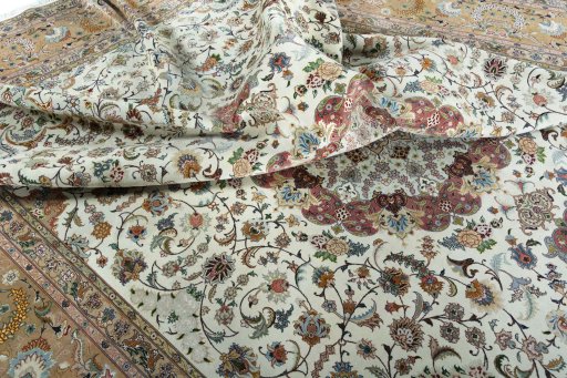 Surface texture of 2000s Tabriz 50/60/70 Raj rug with natural Cork and intricate pattern