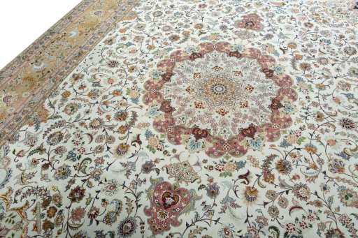Backside of handmade 2000s Tabriz 50/60/70 Raj rug showing knot structure and weave density