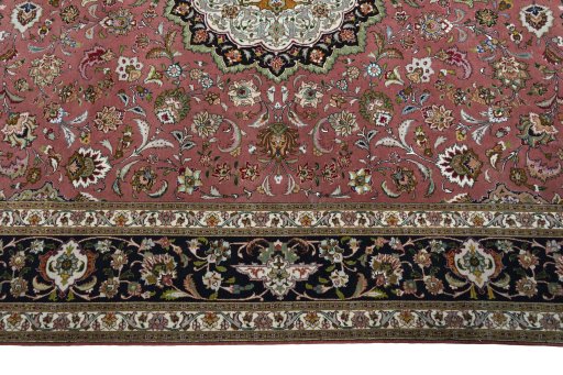 Corner detail of 2000s Tabriz 50/60/70 Raj rug showing border pattern and Cork pile