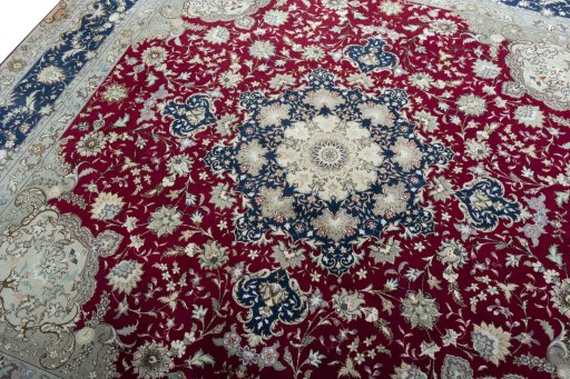 Backside of handmade 2000s Tabriz 50/60/70 Raj rug showing knot structure and weave density