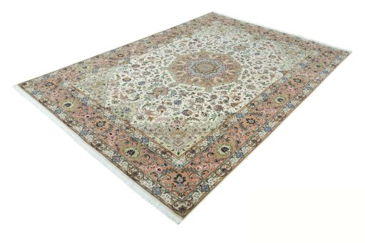 Corner detail of 2000s Tabriz 50/60/70 Raj rug showing border pattern and Cork pile