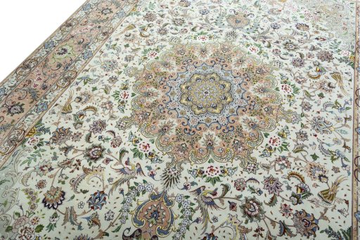 Backside of handmade 2000s Tabriz 50/60/70 Raj rug showing knot structure and weave density