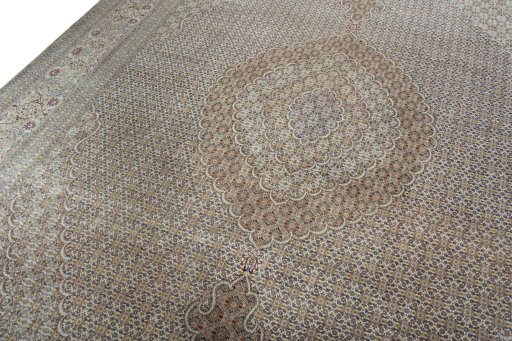 Backside of handmade 2000s Tabriz 50/60/70 Raj rug showing knot structure and weave density
