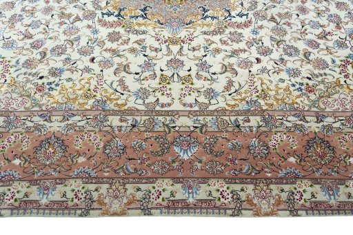 Corner detail of 2000s Tabriz 50/60/70 Raj rug showing border pattern and Cork pile