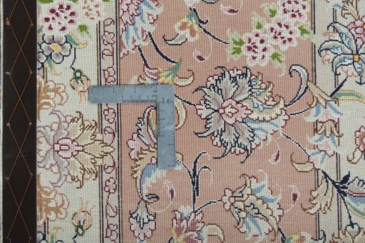 Backside of handmade 2000s Tabriz 50/60/70 Raj rug showing knot structure and weave density