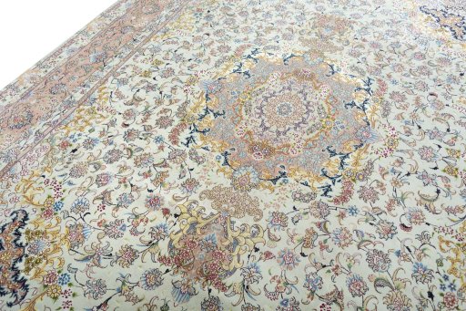 Backside of handmade 2000s Tabriz 50/60/70 Raj rug showing knot structure and weave density