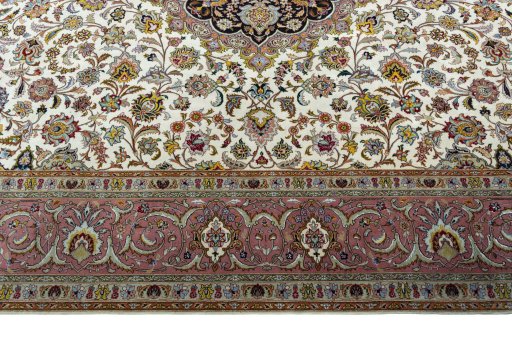 Corner detail of 2000s Tabriz 50/60/70 Raj rug showing border pattern and Cork pile