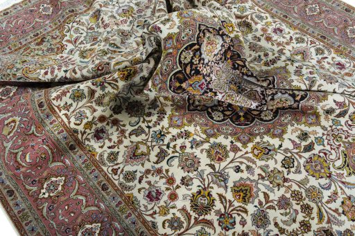 Surface texture of 2000s Tabriz 50/60/70 Raj rug with natural Cork and intricate pattern
