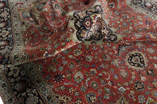 Surface texture of 2000s Tabriz 50/60/70 Raj rug with natural Cork and intricate pattern