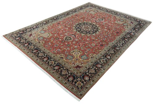 Corner detail of 2000s Tabriz 50/60/70 Raj rug showing border pattern and Cork pile