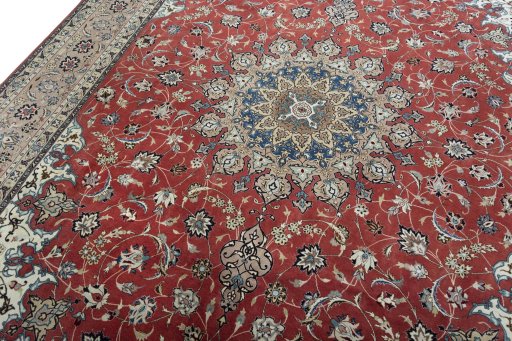 Backside of handmade 2000s Tabriz 50/60/70 Raj rug showing knot structure and weave density