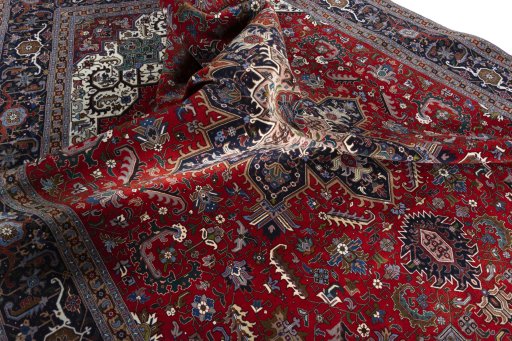 Surface texture of 2000s Tabriz 50/60/70 Raj rug with natural Cork and intricate pattern