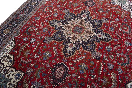 Backside of handmade 2000s Tabriz 50/60/70 Raj rug showing knot structure and weave density