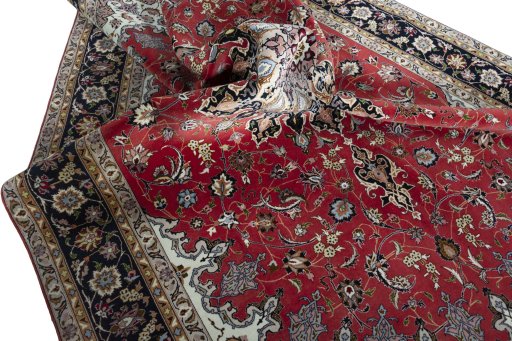 Surface texture of 2000s Tabriz 50/60/70 Raj rug with natural Cork and intricate pattern