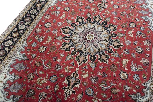 Backside of handmade 2000s Tabriz 50/60/70 Raj rug showing knot structure and weave density