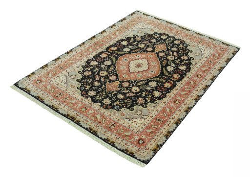 Corner detail of 2000s Tabriz 50/60/70 Raj rug showing border pattern and Cork pile